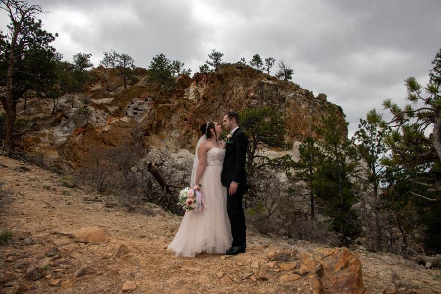 groom holds bride
